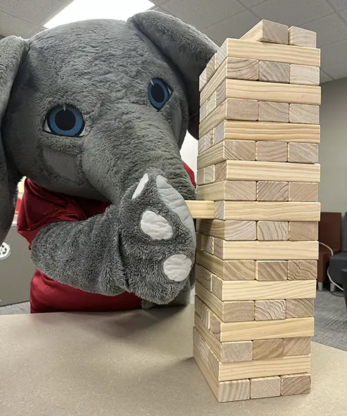 Big Al playing Jenga